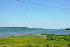 Entebbe is on the shores of Lake Victoria. It is not to be confused with Victoria Falls which is in Zimbabwe.  Victoria  Falls is fed by the Zambezi River from Botswana.