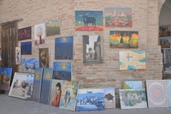 Local artists display their art inside the former Madrassas.