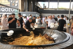 Massive containers to prepare the Plov.  The meat is then added at another station.