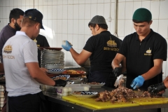 Preparing the meat to be served with the Plov.