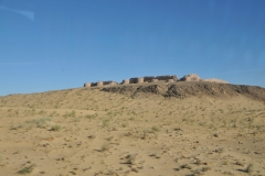 We walked up and around this site.  The site consists of three fortresses which were built from the 4th century BC to the 7th century AD.  The fortresses were part of a series of forts at the edge of the Kyzylkum Desert, which provided defense against raids by nomads and the Saka of the Syr Darya delta.