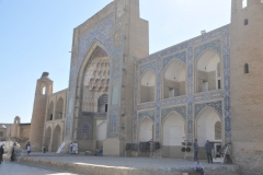 Built in 1652, a few centuries later than Ulugh-Beg Madrasah (built in 1417), Abdulaziz-Khan Madrasah, which stands across from it, is an integral part of Bukhara’s most outstanding architectural ensemble. Abdulaziz-Khan Madrasah marks the remarkable progress of medieval Central Asian architecture; it shows us how amazingly high the skills of Central Asian architects, builders and artists were at the time.