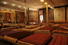 The other side of the wall, to the left,  is where the ladies are working on the rugs. These are the completed items for sale. Amazing.