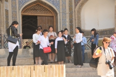 Local students taking a tour of the Mir-i-Arab religious school.