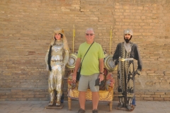 Myself standing with two mannequins dressed in the time period.