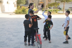 Chris Tripodi, our guide for Adventures Abroad, having fun with some local boys just playing in an area of the city.